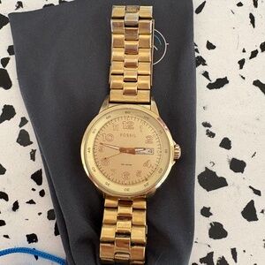 Gold fossil watch